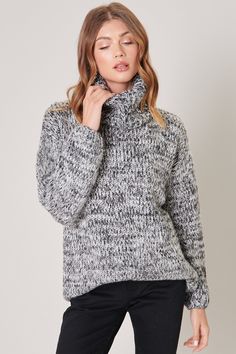 Cozy vibes in our chunky and comfy Salt and Pepper Tunic Sweater. Pair it with leggings and a beanie for a lazy day around the house.- Turtleneck sweater- Chunky marled yarn- Drop shoulder with volume sleeve- Tunic length- Color: GraySize + Fit- Model is 5'10" and wearing size S- Measurements taken from size S- Chest: 46 1/2"- Length: 27"Fabric100% AcrylicStyle Number T9172ST Thick Sweaters, Cozy Vibes, Lazy Day, Tunic Length, Tunic Sweater, Wool Sweaters, Grey Sweater, Turtleneck Sweater, Salt And Pepper