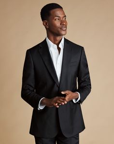 Natural Stretch Twill Suit Jacket - Black | Men's Charles Tyrwhitt Natural Stretch Twill Suit Jacket - Black Size 36R Wool Slim Fit Black Tuxedo Outerwear, Black Slim Fit Tuxedo Style Outerwear, Classic Fitted Black Outerwear, Formal Black Slim Fit Outerwear, Black Slim Fit Formal Outerwear, Black Slim Fit Outerwear For Formal Occasions, Black Slim Fit Outerwear With Notch Lapel, Black Notch Lapel Slim Fit Outerwear, Black Slim Fit Outerwear With Suit Collar