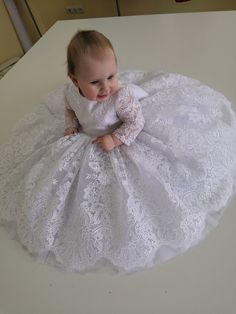 If you are looking for a beautiful christening dress! You found it :) Sewn with love and attention to detail, this is a charming christening dress. The perfect birthday gift. The dress can be sewn in two versions of lace fabric-white and ivory. The dress is floor-length, but at your request it can be sewn to any length. The top of the dress is made of high-quality guipure with beautiful flowers. There are also long sleeves. The skirt is lush, with many layers of tulle. The lining of the dress is made of 100% cotton. If your sizes do not meet our standards, we can sew the dress individually. Feel free to contact us if you have any questions The dress is made to order within 7-14 days White Lace Patchwork Princess Dress For Wedding, White Lace Patchwork Princess Wedding Dress, White Elegant Baptism Dress For First Birthday, Elegant White Baptism Dress For First Birthday, Elegant Baptism Princess Dress With Lace Trim, Elegant Princess Dress With Lace Trim For Baptism, White Princess Dress With Lace Trim For First Communion, Elegant White Princess Dress With Lace Patchwork, White Princess Lace Dress For First Communion