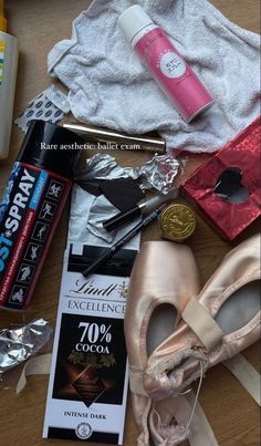 the contents of a ballet shoe and other items on a table