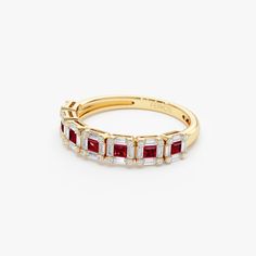 Made to Order
 Gold Kt: 14K (also available in 18K)
 Available Gold Color: Rose Gold, Yellow Gold, White Gold
 Width: 3.8 MM
 Height: 2.25 MM
 Baguette Diamond: 28 Pc 2 x 1 MM
 Round Diamond: 28 Pcs 0.90 MM
 Square Ruby: 7 Pc 2 x 2 MM
 Diamond Carat Weight: 0.35 ctw
 Ruby Carat Weight: 0.45 ctw
 Diamond Color-Clarity: G Color VS/SI Clarity Elegant Ruby Ring With Baguette Diamonds For Formal Occasions, Elegant Ruby Ring With Baguette Diamonds For Formal Events, Formal Ruby Ring With Baguette Diamonds, Anniversary Ruby Jewelry With Baguette Diamonds, Anniversary Jewelry With Baguette Diamonds And Ruby, Ruby Jewelry With Baguette Diamonds For Anniversary, Elegant Ruby Ring With Baguette Diamonds In Yellow Gold, Elegant Yellow Gold Ruby Ring With Baguette Diamonds, Red Baguette Cut Diamond Ring