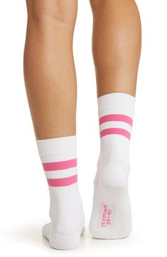 Playful stripes grace the ribbed shaft of these soft compression socks designed to promote circulation and energize your stride in moisture-wicking comfort. Organic cotton/polyamide Machine wash, tumble dry Made in Germany White Stretch Running Socks, Sporty Stretch Lightweight Socks, Breathable Pink Workout Socks, Pink Breathable Workout Socks, Sporty Stretch Ribbed Socks, White Moisture-wicking Stretch Socks, White Stretch Socks For Sports, White Stretch Sports Socks, Go-dry Stretch Athleisure Socks