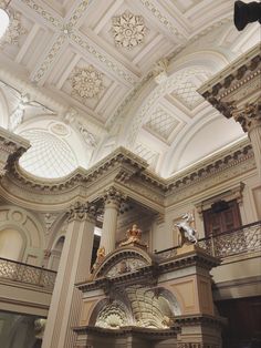 an ornately decorated building with high ceilings