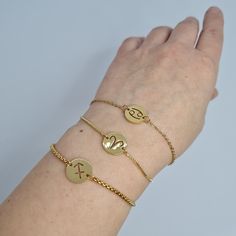 Zodiac sign bracelet. Gold-tone chain bracelet. The unisex adjustable link bracelet. Zodiac sign size: 1.2 cm/0.5 inches. Chain bracelets max length:      No 1-21 cm/8 inches,      No 2-21 cm/8 inches,      No 3-24 cm/9.5 inches. The design of the bracelet can be changed to your liking. Maybe you want to see other zodiac bracelets too: https://www.etsy.com/shop/CharmAccessoriesShop?ref=seller-platform-mcnav&section_id=33642244 You can contact me if you have any questions. Thank you for visiting! Zodiac Sign Bracelet, Silk Wrap Bracelets, Bolo Bracelet, Unique Brooch, Zodiac Bracelet, Silk Headband, Chain Bracelets, Free Bracelet, Bracelet Gold