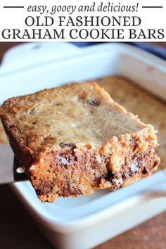 a close up of a piece of cake on a fork with text overlay that reads easy, gooey and delicious old fashioned graham cookie bars