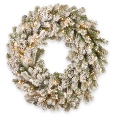 This Snowy Sheffield Spruce wreath features Feel Real® branch tip technology, creating a decoration with remarkable realism. These crush-resistant branch tips are molded from real tree branches for an authentic appearance. It is pre-strung with 70 Twinkly™ brand smart LED lights that offer a wide array of color and function choices. Lights are operated through a direct or home Wi-Fi connection. A downloadable App from Twinkly provides a broad selection of advanced and unique effects as well as l Spruce Wreath, Pre Lit Wreath, Lighted Wreaths, Battery Operated Led Lights, Twinkly Lights, Artificial Christmas Wreaths, Artificial Wreath, Wreaths And Garlands, Battery Operated Lights