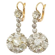 Antique large old mine cut diamond cluster earrings with large diamonds estimate weight of 7 carats H color white excellent spark earrings length 3.5 cm in white and yellow gold setting earrings head diameter 13.80mm and each stone diameter around 4.50mm dates back to Europe 1910/1920.c Diamond Gold Earrings, Diamond Cluster Earrings, Old Mine Cut Diamond, Yellow Gold Setting, Antique Diamond, Diamond Gold, Cluster Earrings, Diamond Cluster, Earrings Dangle