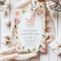 a baby shower is shown with flowers on it