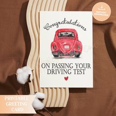 congratulations card on passing your driving test with cotton floss and cotton balls next to it