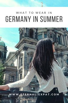 a woman standing in front of a building with text overlay that reads what to wear in germany in summer