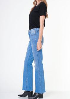 This comfort stretch denim boasts a modern flare, mid-rise waistline, and scissor-cut hem with a subtle slit. It's the perfect combination of fashion and comfort, crafted with a luxurious blend of premium fabrics for superior quality and stretch. Model is 5'10" wearing size 26. Approx. Rise: 9.5" Inseam: 31.5" Approx. Knee: 15" Leg opening: 20" 99% Cotton; 1% SpandexMade in USA Fits true to size. Scissor Cut, Independent Designers Fashion, Coat Dress, Badger, Stretch Denim, Jacket Dress, Blazer Jacket, Mid Rise, Shirt Blouses