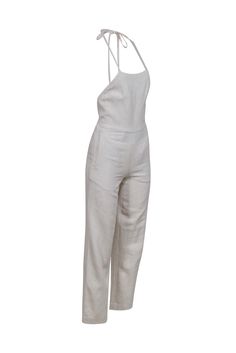 Look sharp and stay cool in this stylish, beige linen blend halter jumpsuit from Club Monaco! Featuring a must-have tie back detail and roomy pockets, this classically chic silhouette is perfect for any summer outing. Strike a pose in this summer staple with platform sandals and gold hoops! Size 00 Shell 24% Lyocell, 21% Viscose, 19% Cotton, 19% Modal, 17% Linen Lining 100% Polyester Invisible zipper back Halter and open tie back Two front slip pockets Bust 32" Waist 28" Shoulder to hem 56.5" Linen Jumpsuit For The Beach, Beige Linen Jumpsuits And Rompers For Loungewear, Beige Linen Overall Jumpsuits And Rompers, Beige Linen Overalls Jumpsuit, Neutral Summer Jumpsuits And Rompers With Pockets, Summer Neutral Jumpsuits And Rompers With Pockets, Summer Neutral-colored Jumpsuits And Rompers With Pockets, Chic Beige Linen Jumpsuits And Rompers, Fitted Linen Jumpsuits And Rompers With Pockets