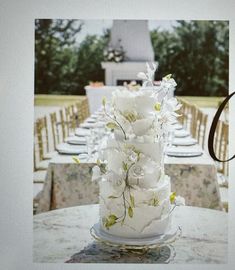 a wedding cake sitting on top of a table