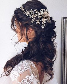 a woman wearing a bridal hair comb