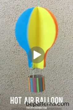 a hot air balloon hanging from the ceiling with text overlay that reads, hot air balloon