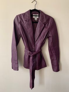 Spiegel plum soft leather blazer. One button with leather tieback. Beautiful condition. Size 6. Purple Business Outerwear For Fall, Fitted Burgundy Leather Jacket For Work, Formal Belted Leather Jacket, Burgundy Leather Jacket For Spring Workwear, Purple Business Outerwear For Spring, Chic Purple Blazer For Fall, Spring Business Blazer In Purple, Spring Purple Business Outerwear, Spring Business Purple Blazer