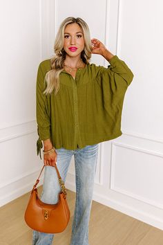 You and this darling green shift top were made for each other with its lightweight material, a button up front with a rounded neckline, long loose sleeves with tie closure cuffs, and a relaxed silhouette that falls into a straight hemline! Measurements S : Bust 54", Hip 48", Length 23.5", Sleeve Length 21", Waist 52". M : Bust 56", Hip 50", Length 24", Sleeve Length 21", Waist 54". L : Bust 58", Hip 52", Length 24.5", Sleeve Length 21.5", Waist 56". XL : Bust 60", Hip 54", Length 25", Sleeve Len Made For Each Other, Concert Fashion, Loose Sleeves, Essential Dress, Teacher Style, Rounded Neckline, Curve Dresses, Model Fits, Women Clothing Boutique