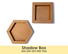 the shadow box is made out of cardboard and has two sides cut out to look like hexagons