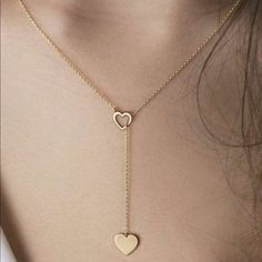 The Details: This Lariat Necklace Features An Adjustable Design With Double Gold Hearts. Length: 25.2”. 100% Metal Gold Heart Lariat Necklace For Gift, Heart-shaped Lariat Necklace For Anniversary, Gold Heart-shaped Lariat Necklace Gift, Elegant Heart-shaped Lariat Necklace, Elegant Heart-shaped Lariat Necklace With Adjustable Chain, Gold Hearts, Lariat Necklace, Gold Heart, Heart Of Gold