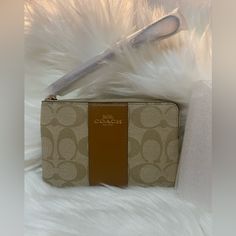 Coach Wristlet Brand New With Tags Ships Next Day Perfect For Gift 100% Original Packaging Beige Clutch With Wrist Strap For Gift, Beige Clutch With Wrist Strap As Gift, Beige Rectangular Clutch With Wrist Strap, Trendy Brown Rectangular Wristlet, Coach Beige Pouch Wristlet, Beige Coach Pouch Wristlet, Beige Rectangular Coach Clutch, Brown Rectangular Wristlet For Everyday Use, Beige Zipper Closure Wristlet Clutch