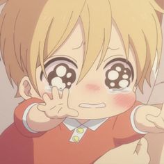 an anime character with big eyes pointing at the camera