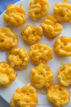 there are some macaroni and cheese bites on the plate