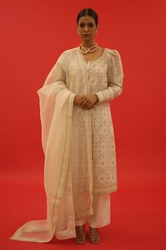 Ivory chanderi A-line kurta with jaal hand embroidery. Comes with palazzo and a dupatta. - Aza Fashions Cream Sharara With Dori Work, White Unstitched Wedding Suit With Gota Work, White Formal Salwar Kameez For Transitional Season, Formal White Salwar Kameez For Transitional Season, Elegant Cream Sets With Dori Work, Formal White Anarkali Set With Chikankari Embroidery, White Bollywood Unstitched Suit With Dori Work, Traditional Salwar Kameez With Gota Work For Formal Occasions, Bollywood Style White Unstitched Suit With Dori Work