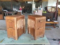 two pieces of wood sitting on top of a table in a room filled with furniture