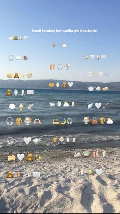 the beach is covered in lots of different things on it's side, including hearts and other objects