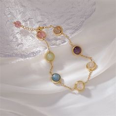 Elevate your accessories collection with some unexpected color and enhance your ensemble with an eclectic edge. 0.24" H x 7.87" L Lobster claw clasp 18k gold-plated copper / crystal Elegant Multicolor Jewelry For Birthday Gift, Adjustable Chain Bracelet For Birthday Gift, Trendy Bracelet Jewelry As Gift For Her, Trendy Hypoallergenic Round Charm Bracelet, Trendy Crystal Bracelet For Gift, Trendy Round Crystal Bracelet For Jewelry Making, Bangle Bracelets For Birthday Gift, Everyday Bracelets, Rainbow Crystal Bracelet