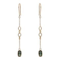 You'll need green sapphire dangle earrings to make a statement with your outfit. These earrings, with cushion cut gemstones, offer a glittering, rich impression. If you want distinctive styles, this piece of jewelry is ideal for you.  Designed with Cushion cut green sapphires in solid gold chain. This beautiful handcrafted green sapphire dangle earrings. It can be a Bridal Shower Gift, Valentine's Gift, Gift For Sister, Mother Daughter Gift, Bride To Be Gift, Bridesmaid Gift, BFF Gift, Best Friend Gift, Anniversary Present, Wife Gift, Gift for Girlfriend or any Holiday Gift for Mother, Sister, Daughter, Grandma, Fiancé, Girlfriend, Valentine, Family or Friend on your list.  PRODUCT DETAILS :-  > Material - 18K Solid Yellow Gold > Gemstone - Green Sapphire > Gemstone shape - Cushion  > Gems Elegant May Birthstone Long Drop Jewelry, Elegant Long Drop May Birthstone Jewelry, Earrings To Make, Bff Gift, Mother Daughter Gifts, Solid Gold Chains, Bff Gifts, Green Sapphire, Wife Gift