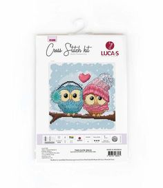 cross stitch kit with two owls sitting on a branch