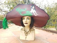 Handmade redish brown leather pirate hat ,hand sewn and dyed ,belt hat band ,ostrich feathers ,hand tooled mermaid design , head size 23 can be stretched larger Pirate Fashion, Pirate Hat, Mermaid Design, Pirate Hats, Ostrich Feathers, Hat Band, Adult Costumes, Hand Sewn, Hand Tools