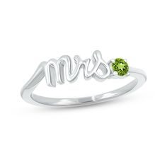 Mark a bride's change of status with this charming ring featuring "Mrs." spelled out in elegant 10K white gold letters. A peridot perfectly punctuates the word art, adding a pop of color and making it a delightful piece to highlight the wedding colors or unique sense of style of the wife-to-be. Mrs Ring, Wife To Be, Lab Created Emerald, Gold Letters, Sterling Ring, Word Art, Wedding Colors, Sterling Silver Rings, Color Pop