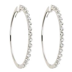 These versatile 18kt white gold large hoop earrings feature 4.86cts of sparkling round diamonds. The skilled setting with only two prongs securing the diamonds, make them light and wearable all day long. Handcrafted in Italy by ZYDO Italian Jewelry.Diamond Quality: Color F, Clarity VSDiamond Carat Weight: 4.86Dimension: Diameter: 2 in. Italian Jewelry, Large Hoop Earrings, Jewelry Diamond, Round Diamonds, Hoop Earrings, In Italy, Diamonds, Sparkle, White Gold