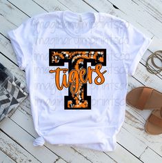 a t - shirt with the word tigers on it