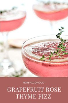 the grapefruit rose thyme fizz is garnished with fresh herbs