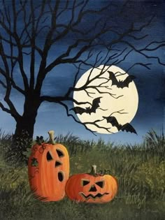 two pumpkins sitting in the grass under a tree with a full moon behind them