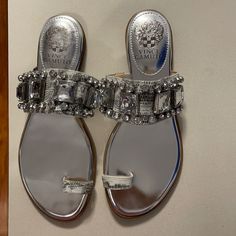 Size 6 1/2 Silver Vince Camuto Sandals Brand New Elegant Slip-on Heels For Vacation, Elegant Flat Sandals For Vacation, Elegant Flat Heels For Vacation, Elegant Toe Post Heels For Vacation, Designer Silver Open Toe Sandals, Chic Silver Flat Sandals, Designer Silver Sandals With Round Toe, Elegant Silver Flat Sandals, Shoes Silver