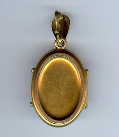 "This antique gold scroll work locket pendant has a white carved cameo on top of a shiny material, perhaps jasper? This has been tested as 10k gold. Measures approximately 1-3/4\" including the loop and just the locket measures approximately 1-3/8\" by 13/16\". Weighs 9.2 grams. Has the photo covers inside with a photo of a cute boy." Oval Cameo Keepsake Jewelry, Antique Cameo Jewelry Keepsake, Antique Cameo Jewelry For Keepsake, Victorian Cameo Oval Locket Necklace, Victorian Oval Cameo Locket Necklace, Oval Cameo Jewelry For Memorial, Bronze Oval Cameo Jewelry, Scroll Work, Turquoise Bracelet Cuff