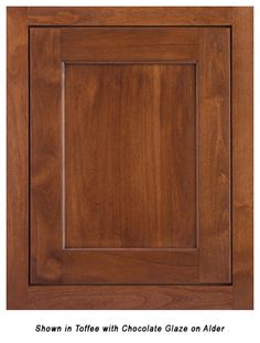 a wooden cabinet door with chocolate glaze on the front and bottom panel, shown in close up