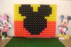 a mickey mouse made out of plastic balls