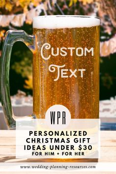 a beer mug sitting on top of a table with the words custom next to it