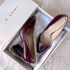 The 90 Mm Lustro From M. Gemi In Burgundy Crocodile Embossed Leather With A Stacked Heel. Size 38.5 Eu. These Have Some Minor Scuffs On The Soles From Being Tried On But I Bought Them New And Never Wore Them. Elegant Burgundy Heels For Workwear, Leather Heels With Crocodile Pattern For Office, Office Leather Heels With Crocodile Pattern, Formal Leather Heels With Crocodile Pattern, Elegant Crocodile Pattern Heels For Work, Leather Heels With Crocodile Pattern For Work, Elegant Crocodile Pattern Heels For Office, Elegant Crocodile Pattern Office Heels, Elegant Heels With Crocodile Pattern And Round Toe