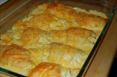 a casserole dish filled with cheesy potatoes