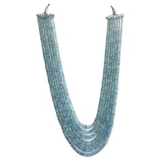 445.90 carats Aquamarine Beaded Necklace 7 Strand Faceted Beads good Quality Gem gemstone - Aquamarine weight - 445.90 carats size - 3 To 6 mm quantity - 7 Strand Length : 20 Inch.