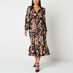 Wear this R & K Originals women's fit-and-flare dress for both daytime events and evening occasions. It's made from smooth satin with a vibrant floral pattern, a V-neckline, long balloon sleeves, a tie-waist, and a long length. Add black pumps for a chic and polished look. Closure Type: Pullover HeadNeckline: V NeckSleeve Length: Long SleeveSleeve Style: Balloon SleeveApparel Length: 49.5 InchesDress Length: Long LengthFiber Content: 98% Polyester, 2% SpandexFabric Description: SatinCare: Line D Flare Dresses, Floral Fit, 4 Dresses, Fit N Flare Dress, Fit Flare Dress, Fit & Flare, Flare Dress, Dress Black, Women Long Sleeve