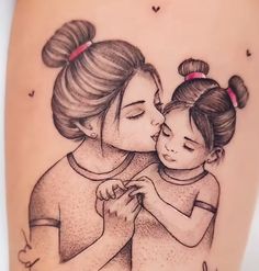 a mother and child tattoo on the thigh with words written in cursive writing