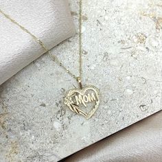 14k Real Yellow Gold Mom Heart Pendant with 0.9mm Singapore Chain, 14k Gold Mother Charm Necklace, Mother's Day Gift, Gift for mom ★DETAILS★ (Pendant) - Material : 14k Gold - Height : 17mm - Width : 15 mm - Weight : 0.6 gram -Single Sided ＊Weights and Dimensions are approximate (Chain) - Material : 14k Gold - Clasp : Spring Ring   - Width : 0.9 mm ＊Weights and Dimensions are approximate **If you are looking for different chain, Please Contact me:) Happy to help:) ★WHAT'S INCLUDED★ - 14k Pendant Ship Base, Real Gold Chains, Jewelry Pouch, Chains Jewelry, Mother's Day Gift, Spring Rings, Gift For Mom, Heart Pendant, Favorite Jewelry