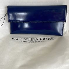 New! Never Used With Tags! Beautiful Deep Blue Almost Patent Look Leather. This Vittoria Napoli Clutch, Holds Phone, A Key And Gloss- Perfect For A Night On The Town! Includes Original Dust Bag Smoke Free Home. Luxury Blue Pouch Clutch, Vintage Blue Rectangular Wallet, Luxury Blue Leather Clutch, Blue Clutch Bag With Gold-tone Hardware, Envelope Clutch, Deep Blue, Italian Leather, Dust Bag, Bag Lady